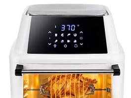 air fryer with glass front, showing a chicken cooking inside